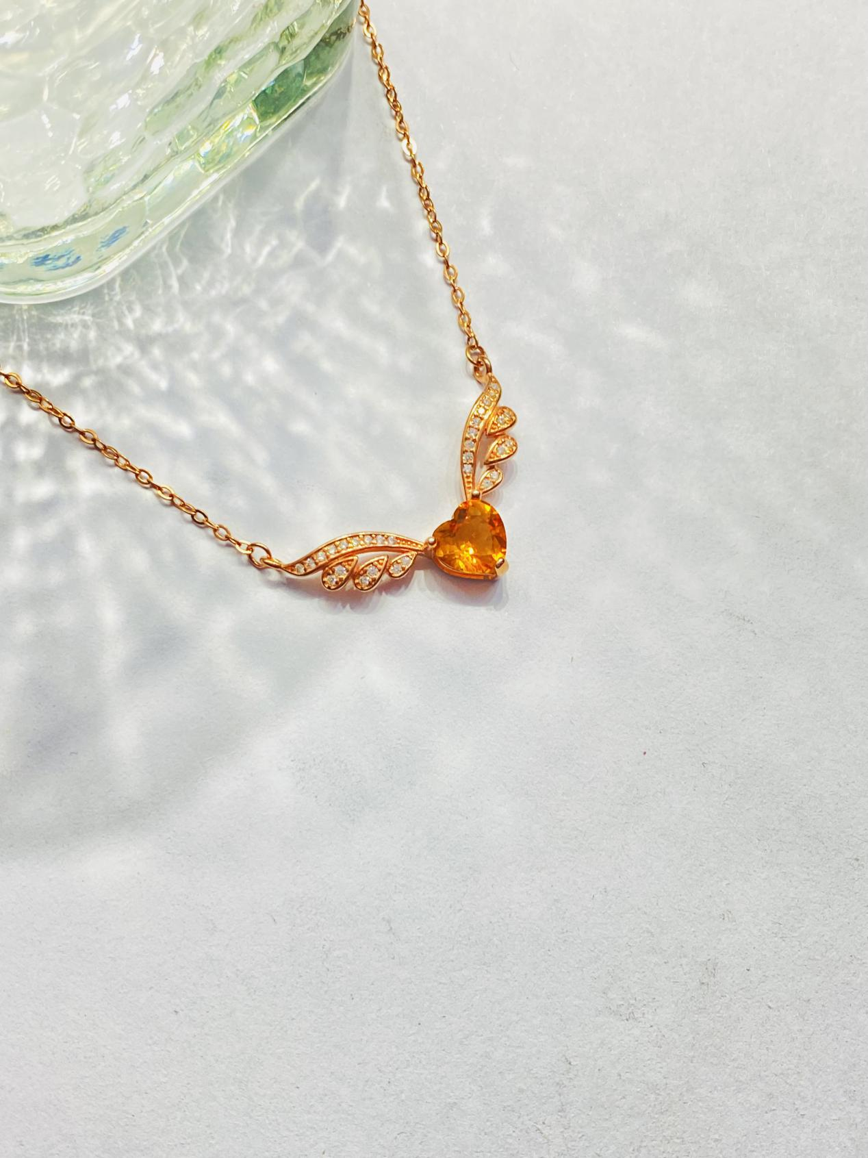 Heart-shaped wings orange diamond necklace